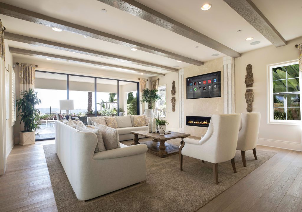 Wall-mounted television integrated into a clean finished living room