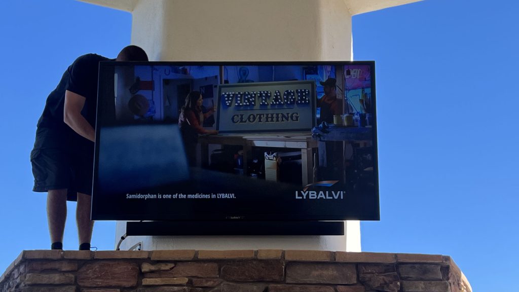 Bright outdoor television mounted on an Arizona patio