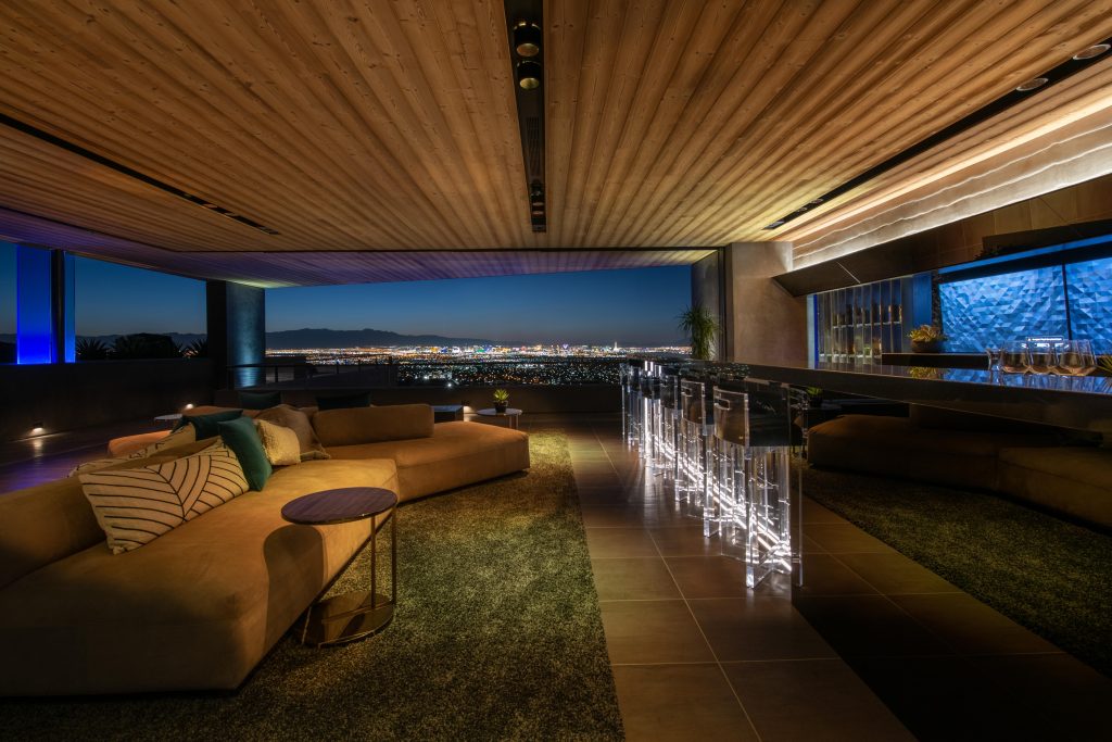 Savant-controlled lighting and entertainment in a finished luxury lounge