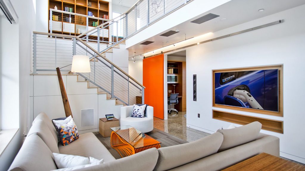 Integrated in-wall speakers providing whole-room audio from one coordinated system