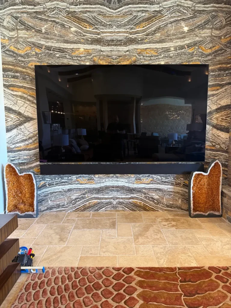 Display and audio integrated into a detailed marble interior
