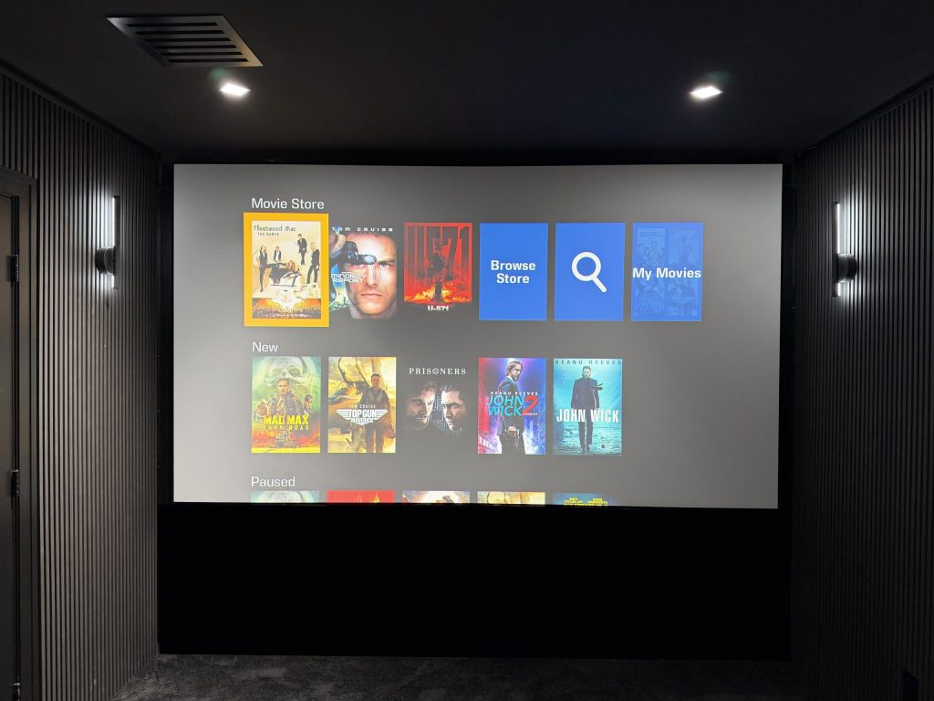 Dedicated cinema with projection and tiered seating
